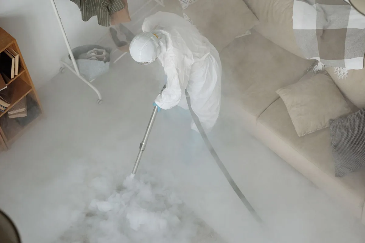 Biohazard cleanup technician in protective equipment, South Park, San Diego, CA